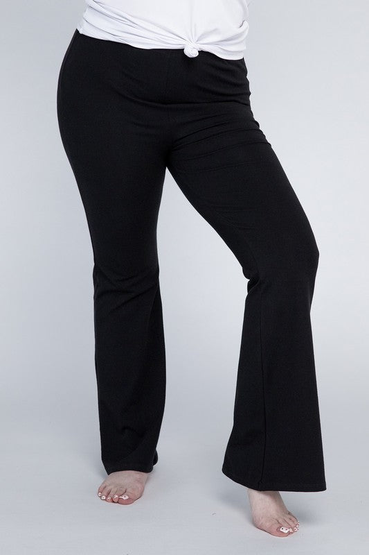 Comfortable black flare pants made from stretchy fabric.
