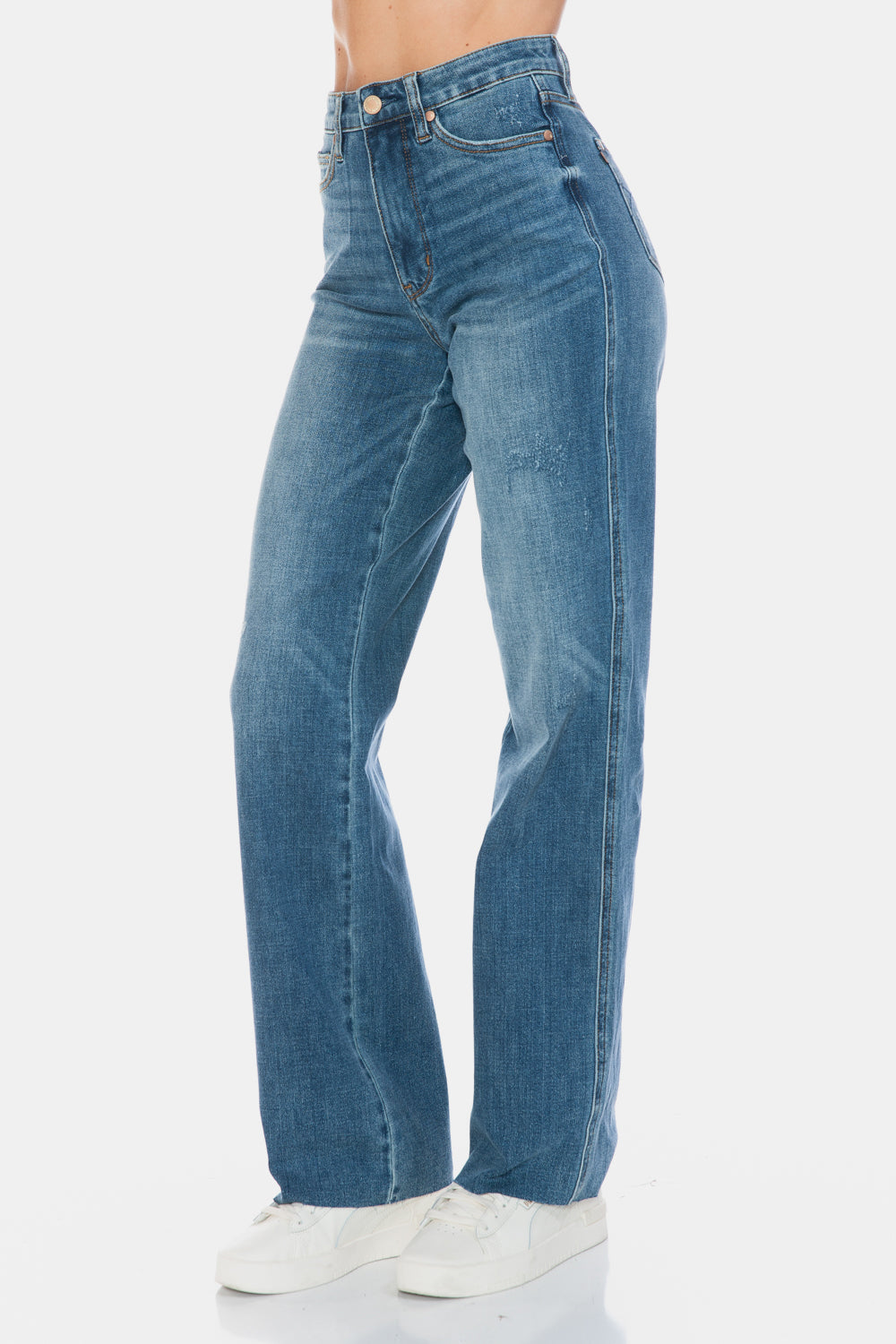 Modern high-waist jeans with flattering tummy support.
