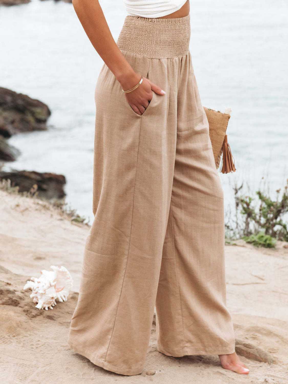 Relaxed fit tan wide leg pants with smocked waistband
