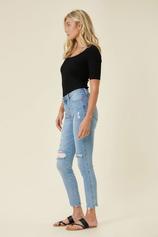 Vibrant M.i.U high waisted skinny jeans with distressed knee




