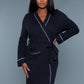 Front close-up of a black waffle robe with a v-neck and color block trim, designed for comfort.
