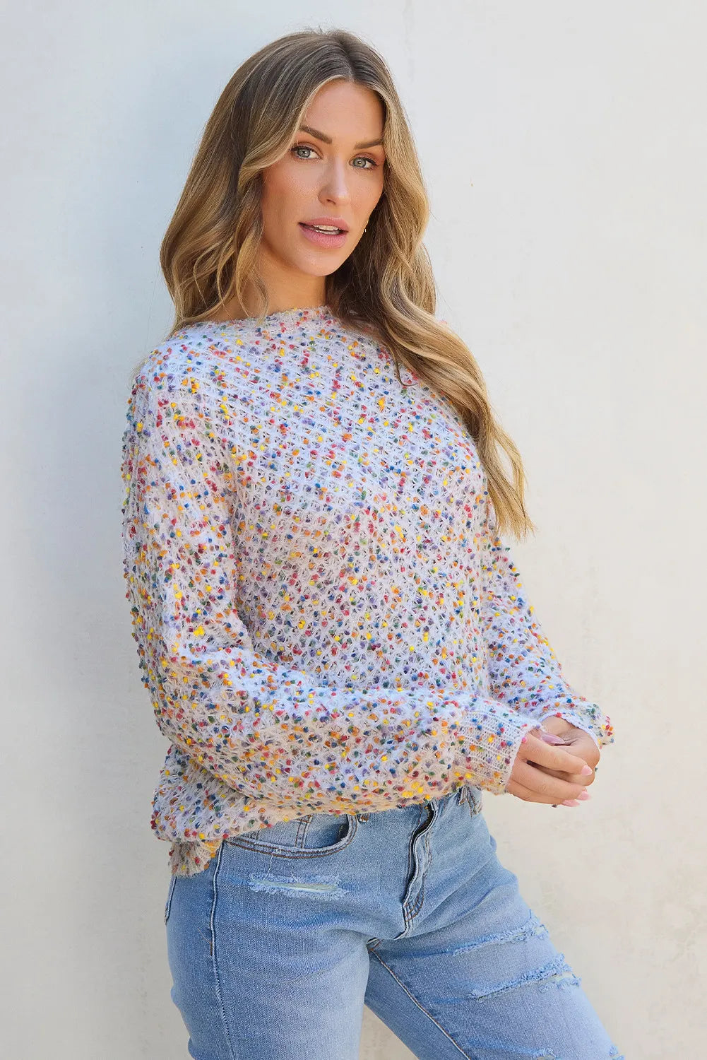 Bright, playful multicolor confetti knit sweater ideal for layering