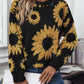 Soft black sweater featuring oversized sunflower pattern | boho aesthetic
