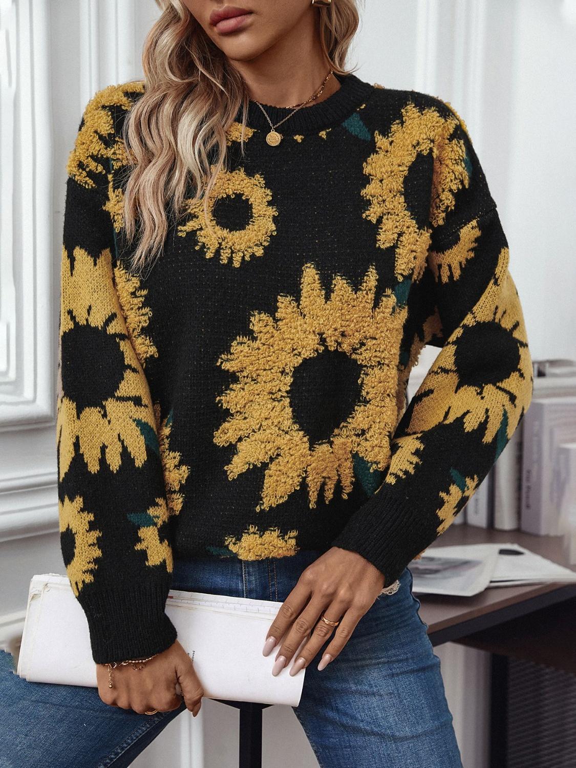 Soft black sweater featuring oversized sunflower pattern | boho aesthetic
