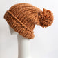 Chunky brown knit beanie, ideal for casual outings and winter adventures
