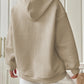 woman wearing camel waffle knit hoodie
