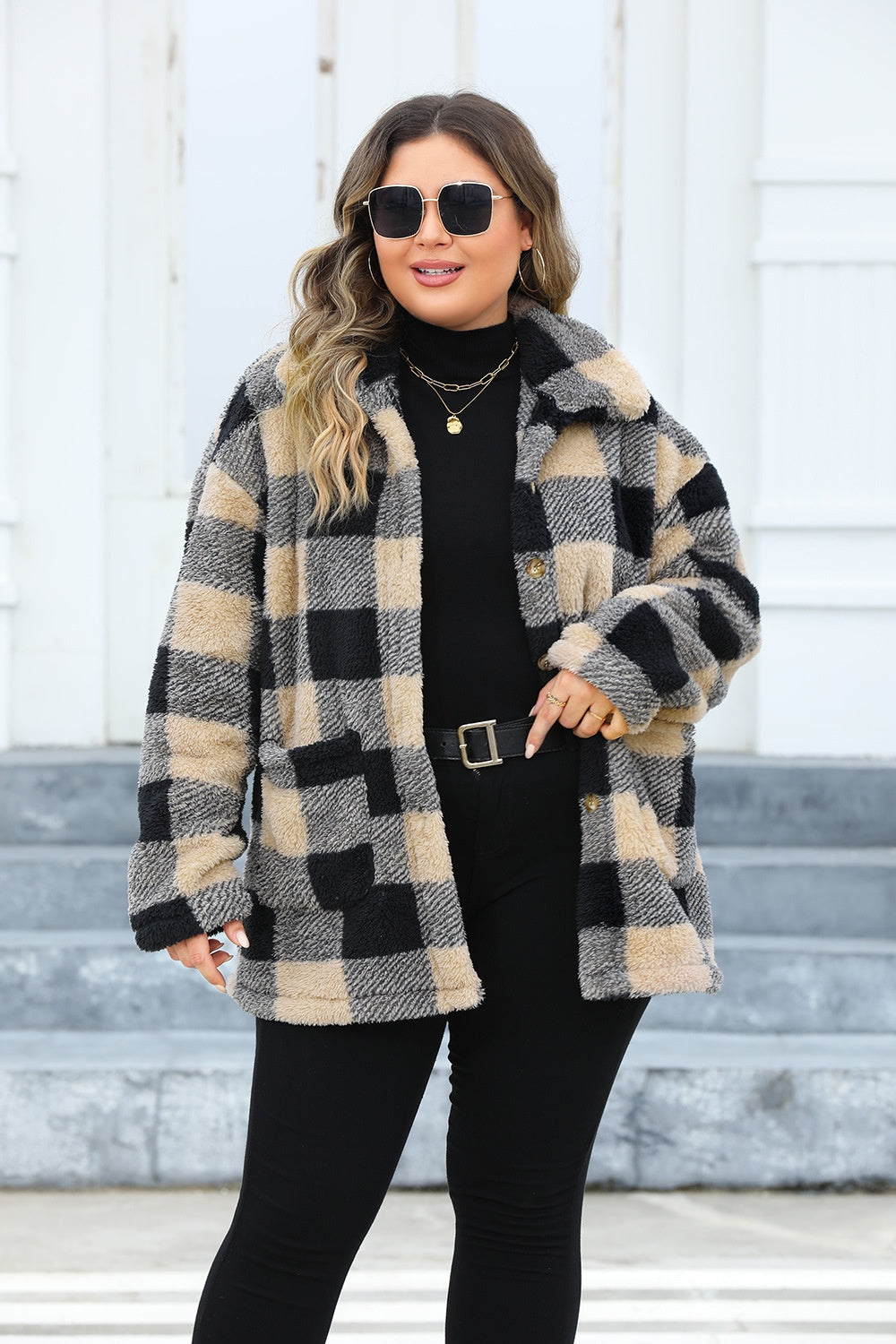 Stylish plus-size camel jacket with black checkered pattern.
