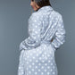 Gray polka dot plush robe with a comfortable fit, ideal for casual wear at home.
