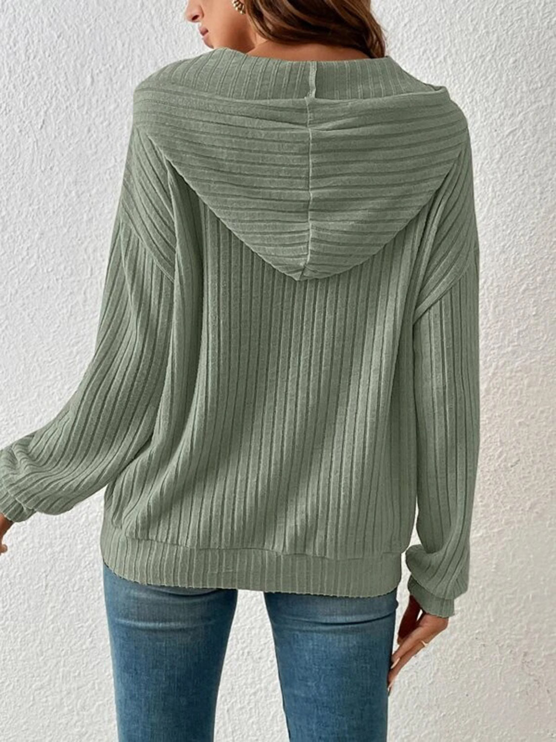 Green ribbed hoodie, perfect for casual or lounge wear.
