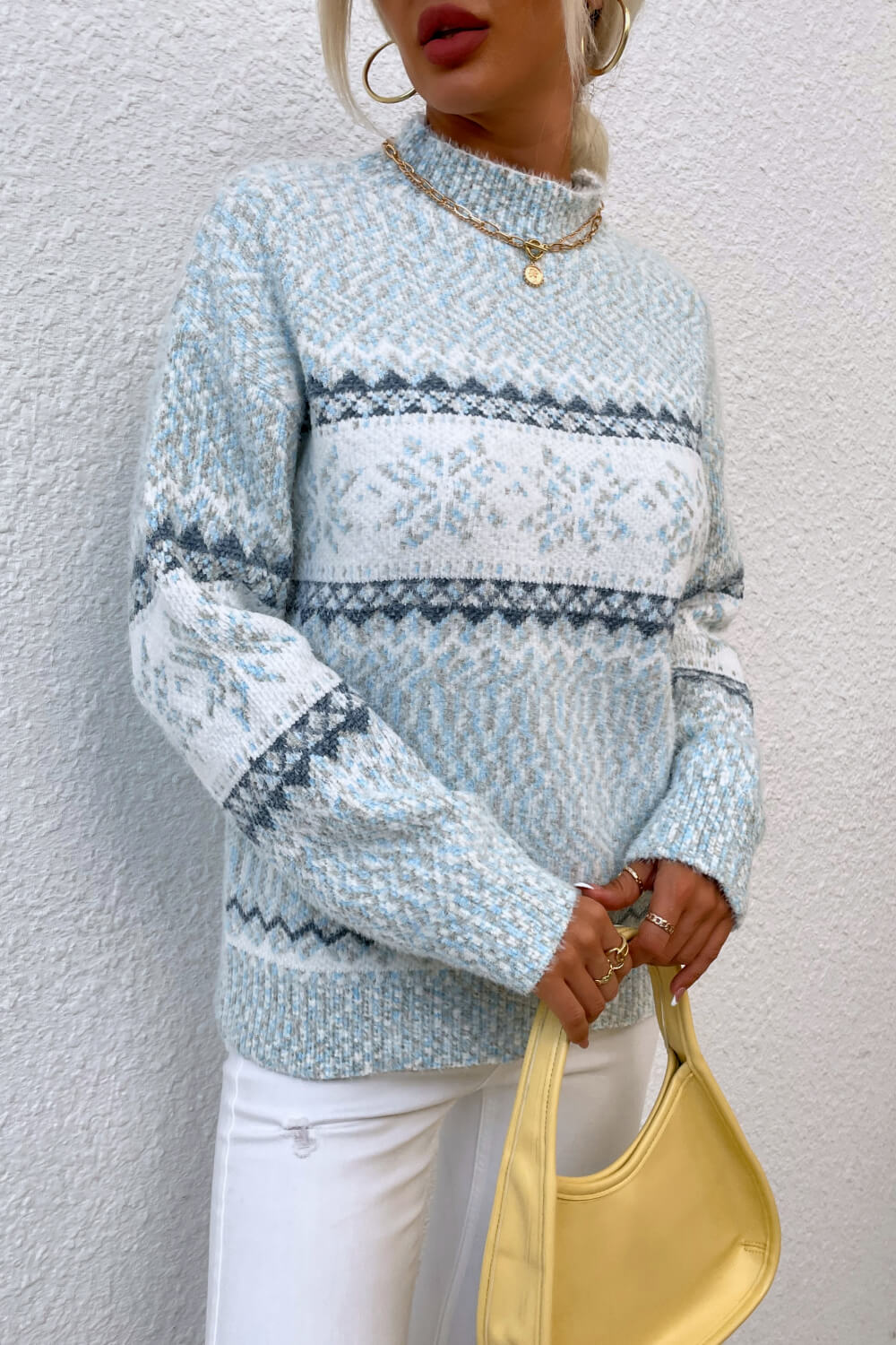 Cozy pastel blue snowflake knit sweater, ideal for winter layering and festive holiday outings.

