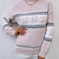 Cozy pink snowflake knit sweater, ideal for festive winter gatherings and everyday wear.

