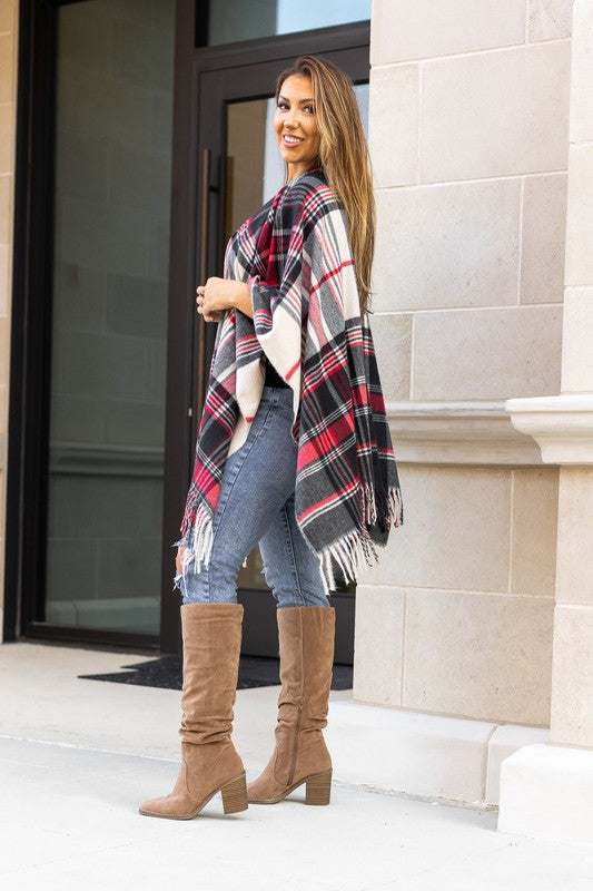 Cozy red plaid shawl with black and white accents.