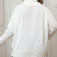 Plus size turtleneck sweater with side button detailing, perfect for fall