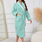 Tiffany blue cozy robe for lounging at home, featuring pockets.
