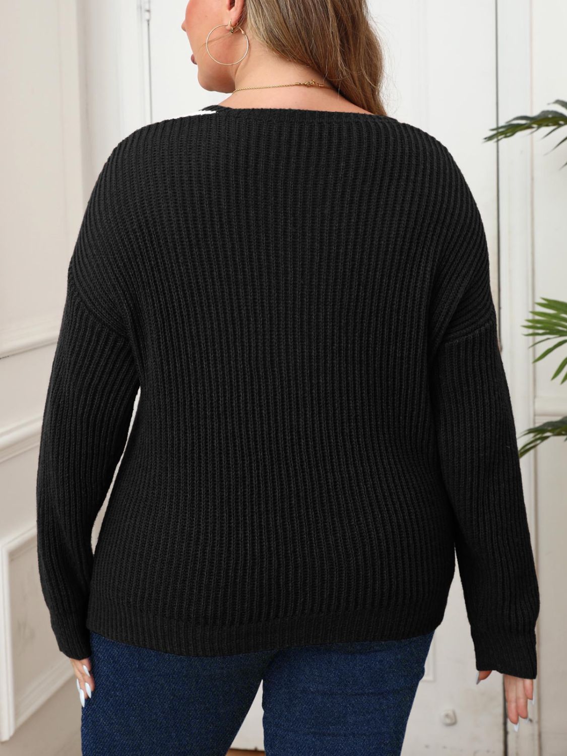 Stylish black V-neck ribbed sweater for plus size women