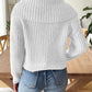 White cable-knit sweater with a modern wide collar design.
