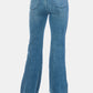 Judy Blue cut hem flare jeans styled casually with white sneakers.
