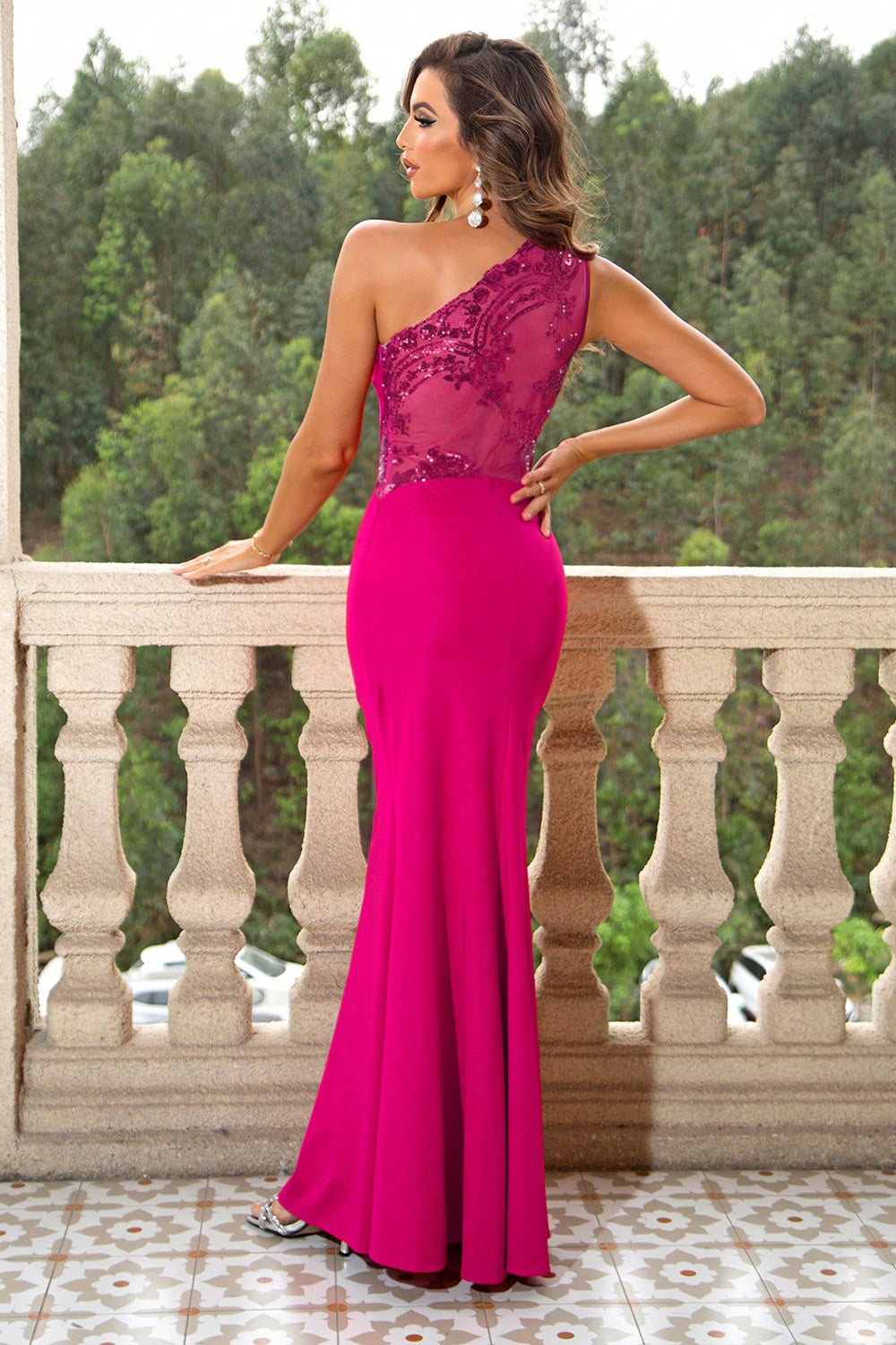Elegant one-shoulder maxi dress available in red, black, green, hot pink. Perfect for formal events, it offers a sleek, flattering fit.