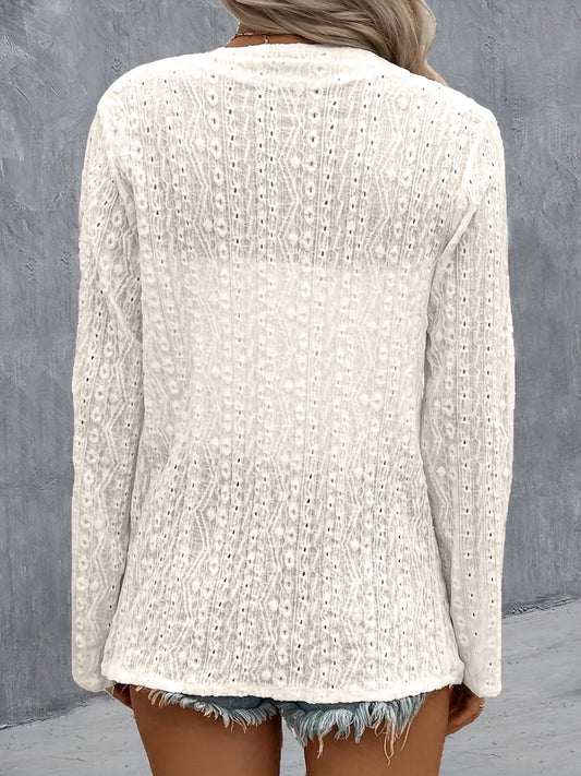 Lightweight white cardigan with open front design.