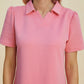 Pink dress with a stylish textured pattern and short sleeves
