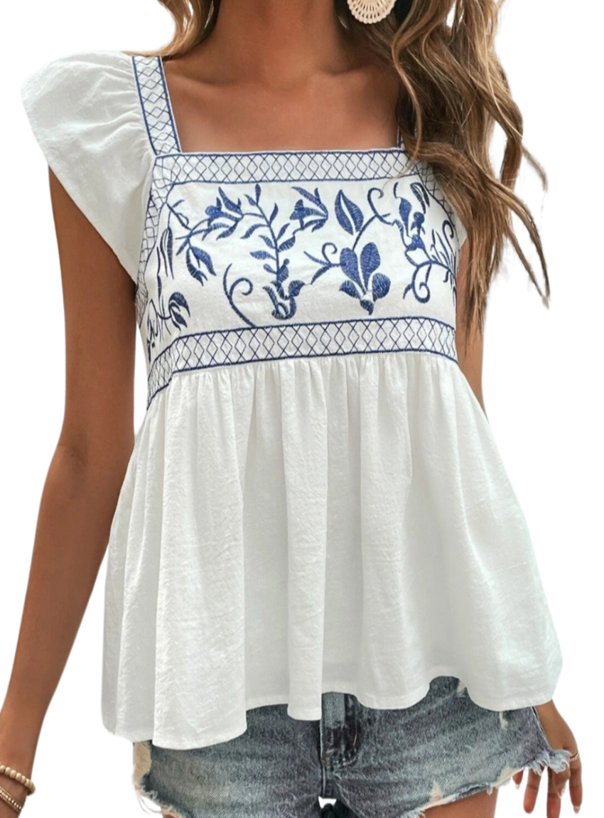 Chic embroidered blouse with a flattering square neck, breezy cap sleeves, and versatile style for any occasion.