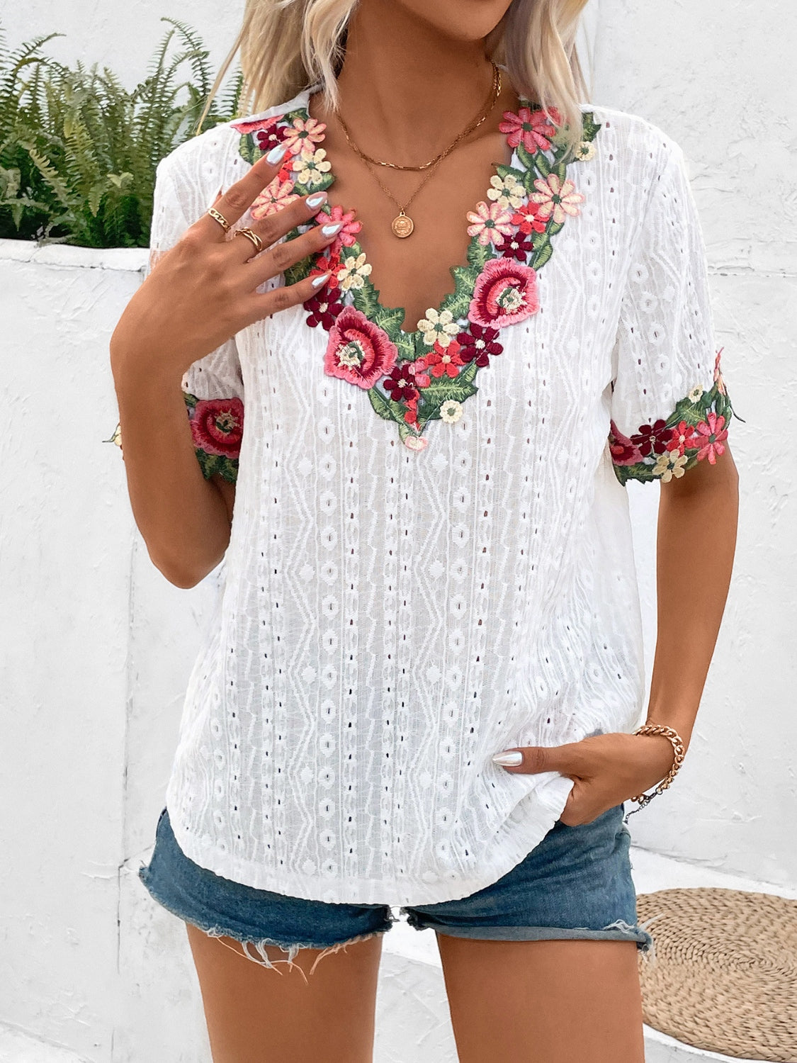 Discover the chic Eyelet Embroidered V-Neck Blouse in four colors. Perfect blend of comfort and style for any occasion. Shop now!