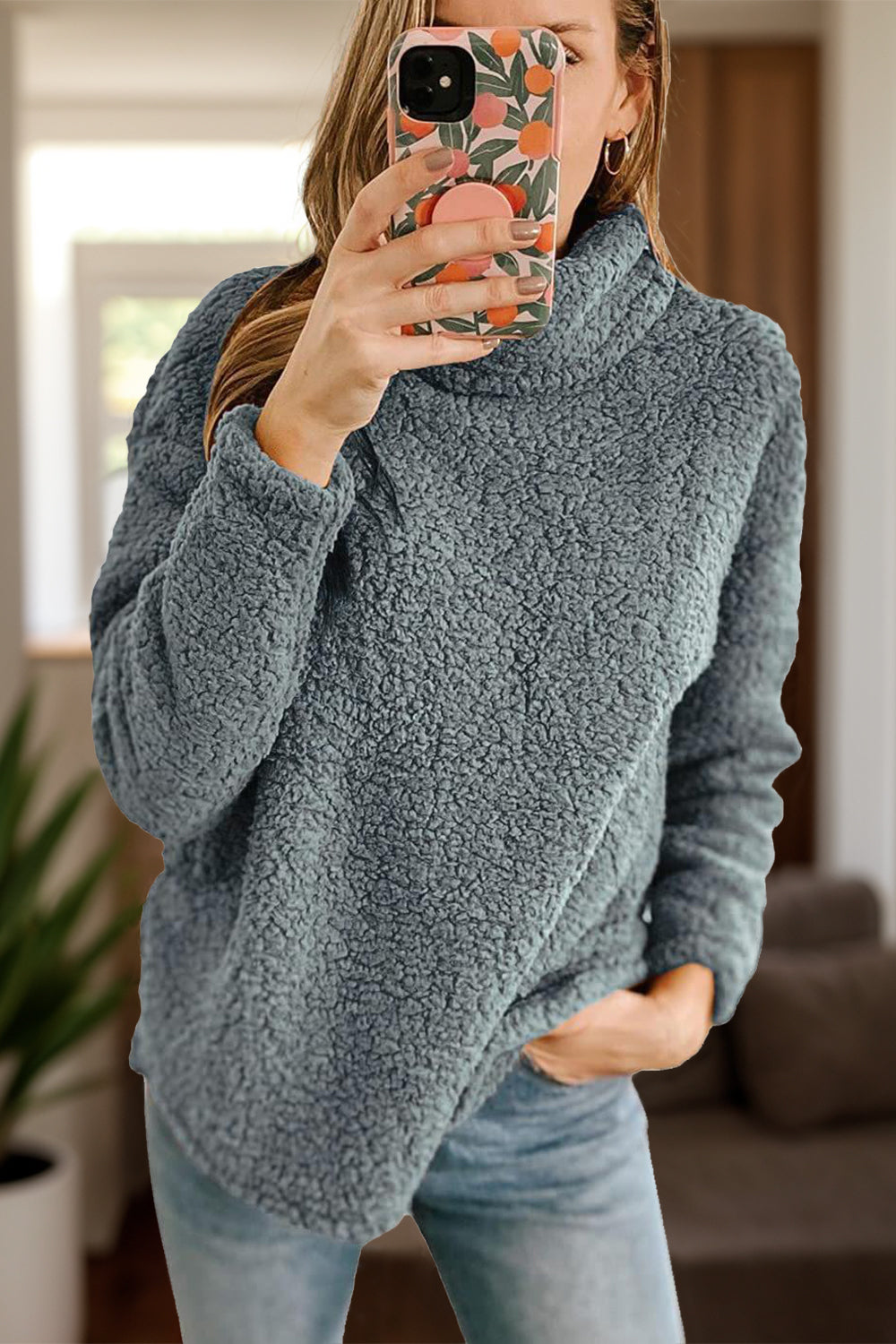 dark gray sherpa fleece pullover with high neck and relaxed fit
