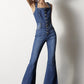 Women’s dark wash flare denim overalls featuring adjustable straps and front button closure.
