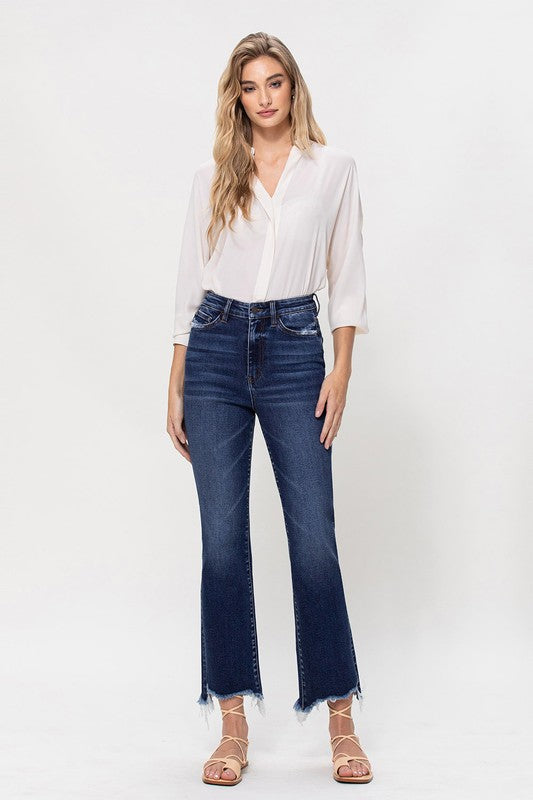 High-rise distressed kick flare jeans featuring a trendy flared silhouette.
