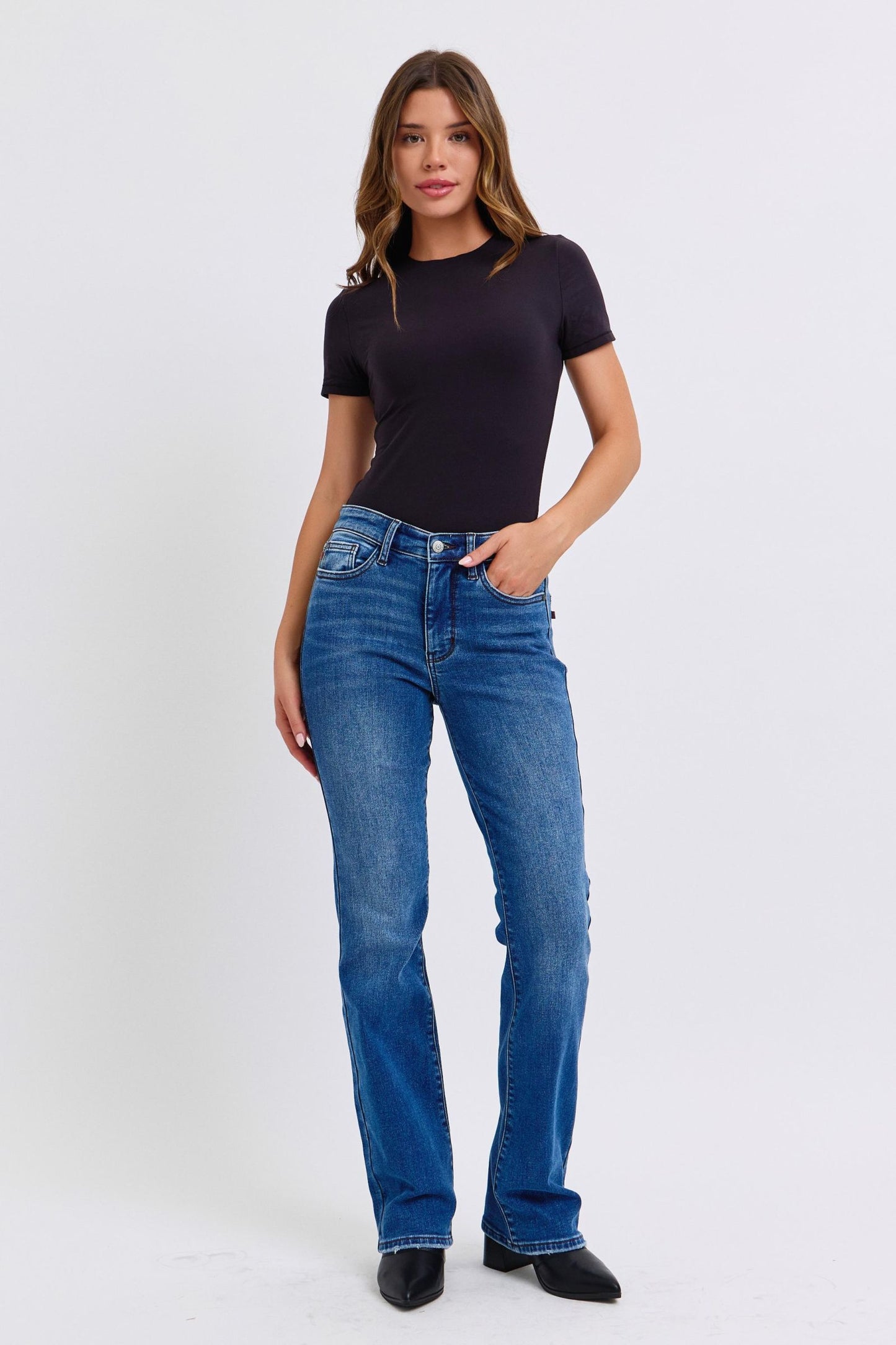 Judy Blue dark wash bootcut jeans for a sleek and warm look
