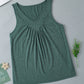 Green sleeveless top with gathered V-neckline