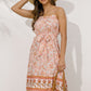 Elegant Boho Chic Midi Dress with feminine floral design.