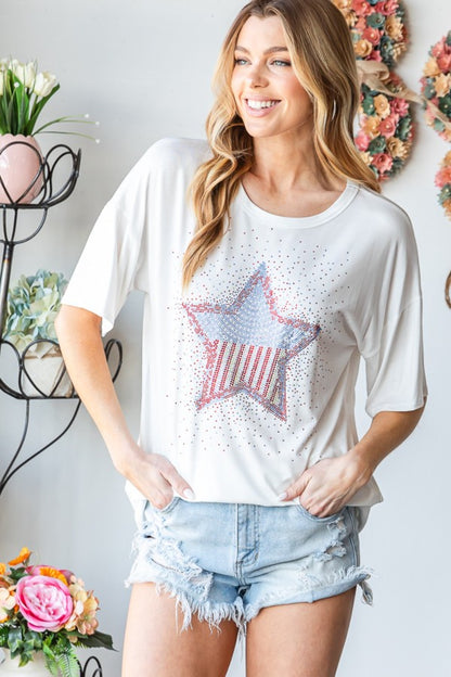 Shine bright in the Heimish Star Patch Tee! A comfy, dazzling top perfect for adding sparkle to your casual style. Easy care, standout fashion.