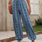 Comfortable blue pants with elastic waistband and bohemian design