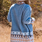 Chic open-front cardigan in blue with tribal details
