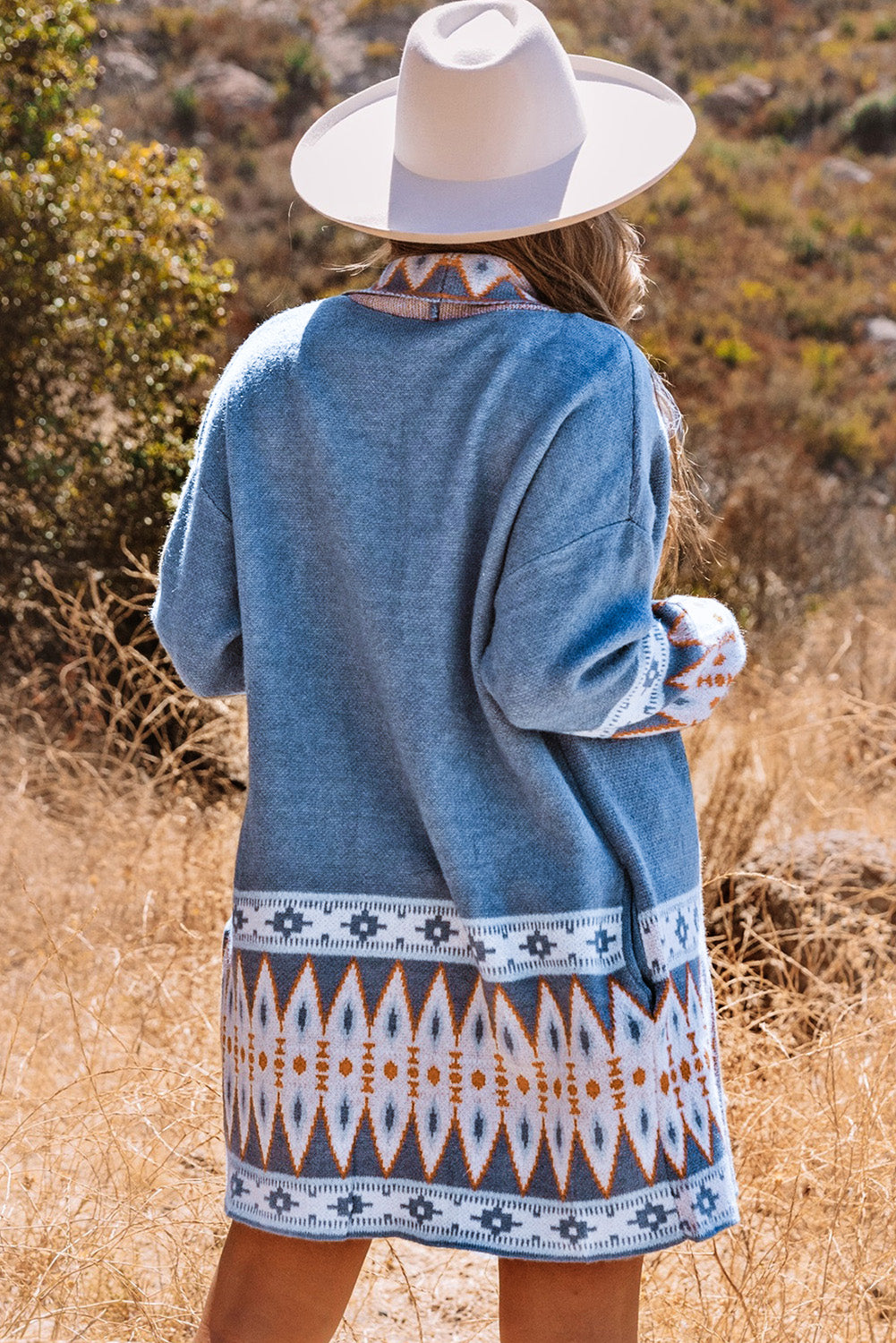 Chic open-front cardigan in blue with tribal details
