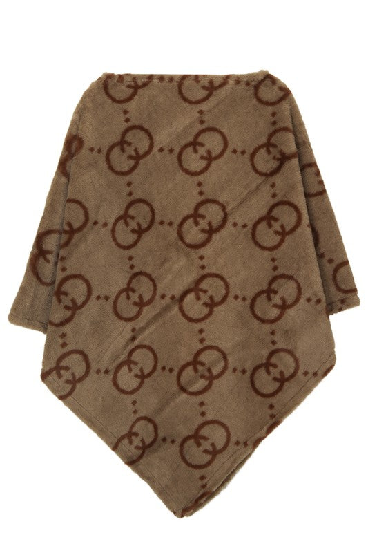 patterned taupe poncho in soft fleece material
