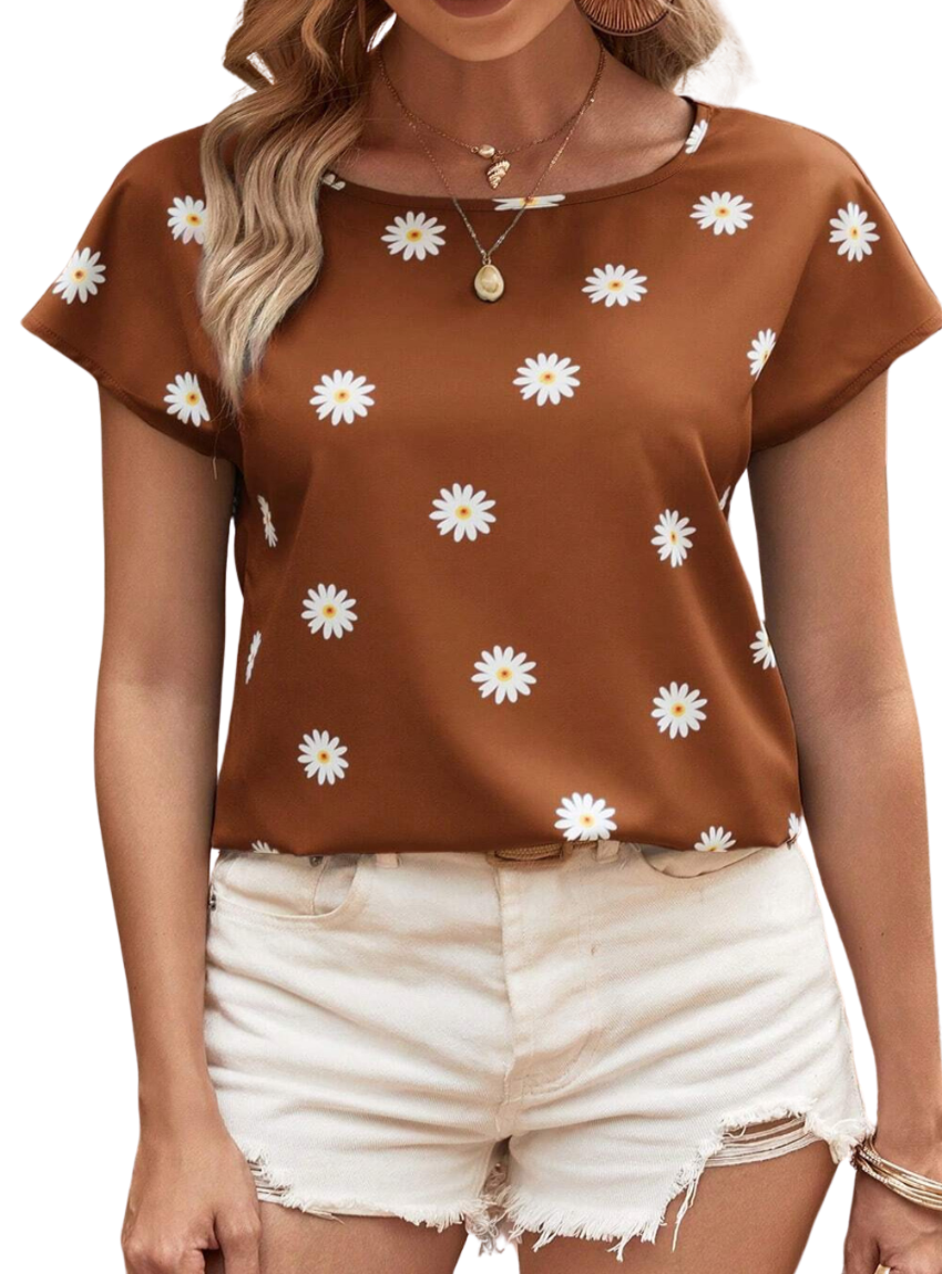 Stay cool and chic in our Daisy Printed Blouse - perfect for any summer occasion with its airy fit and playful design