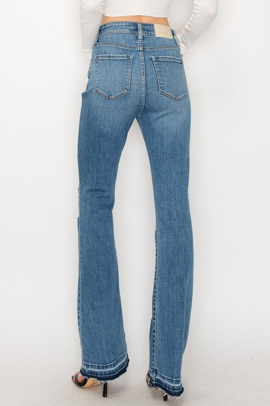 Distressed high-rise bootcut jeans in plus size