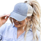 Gray distressed messy bun hat cap with ponytail opening
