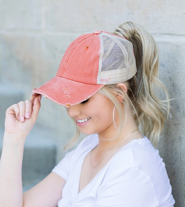 Rust distressed messy bun hat cap with ponytail opening
