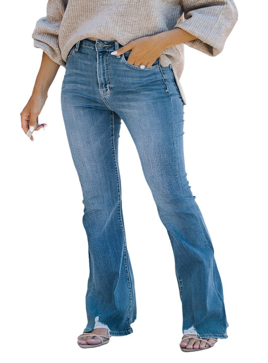 Whimsical Appalachian Boutique Distressed Raw Hem Bootcut Jeans with a stylish and vintage-inspired design.