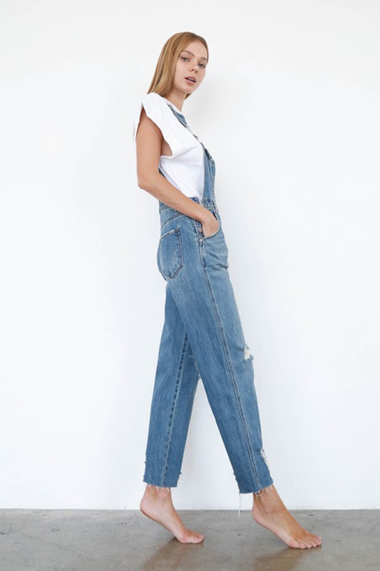 Women’s medium-wash slim straight denim overalls for casual styling.
