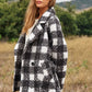 Chic boucle plaid coat for women, featuring side pockets and a lapel neck.
