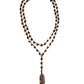 Boho-inspired double-strand jasper necklace featuring a detailed feather pendant.
