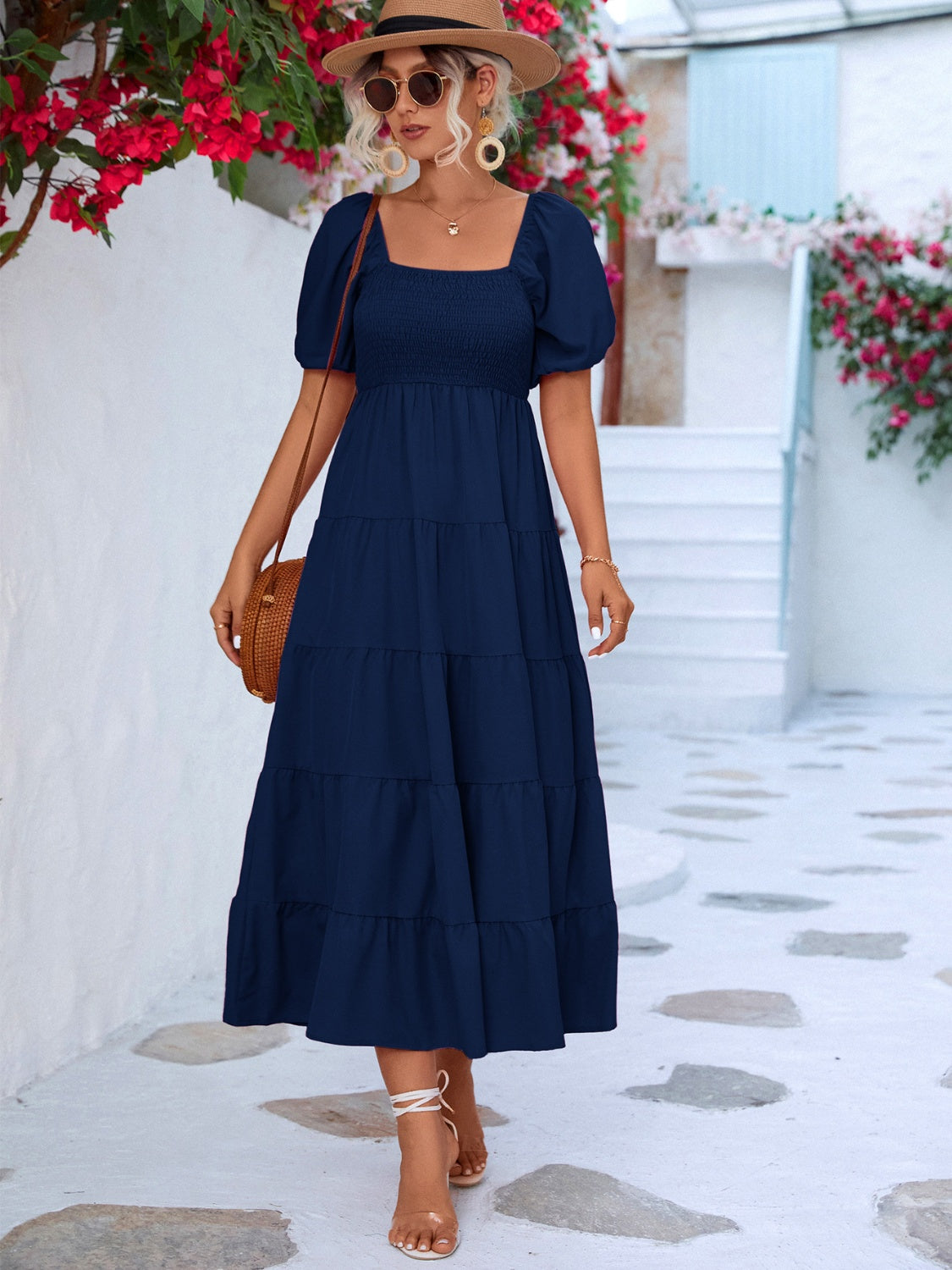 Chic Tiered Smocked Dress in navy, black, & hot pink. Perfect blend of elegance & comfort for any occasion. Shop now for timeless style!