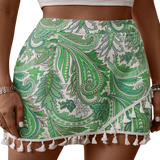Boho-chic tassel hem shorts with an eye-catching paisley print for stylish comfort on sunny days. Perfect for any summer occasion!