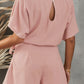 Chic Tie Belt Romper with a flattering fit, perfect for easy styling on warm days or upscale casual events.