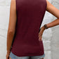 Stylish maroon sleeveless top with delicate black lace neckline, paired with distressed denim shorts for a chic summer look