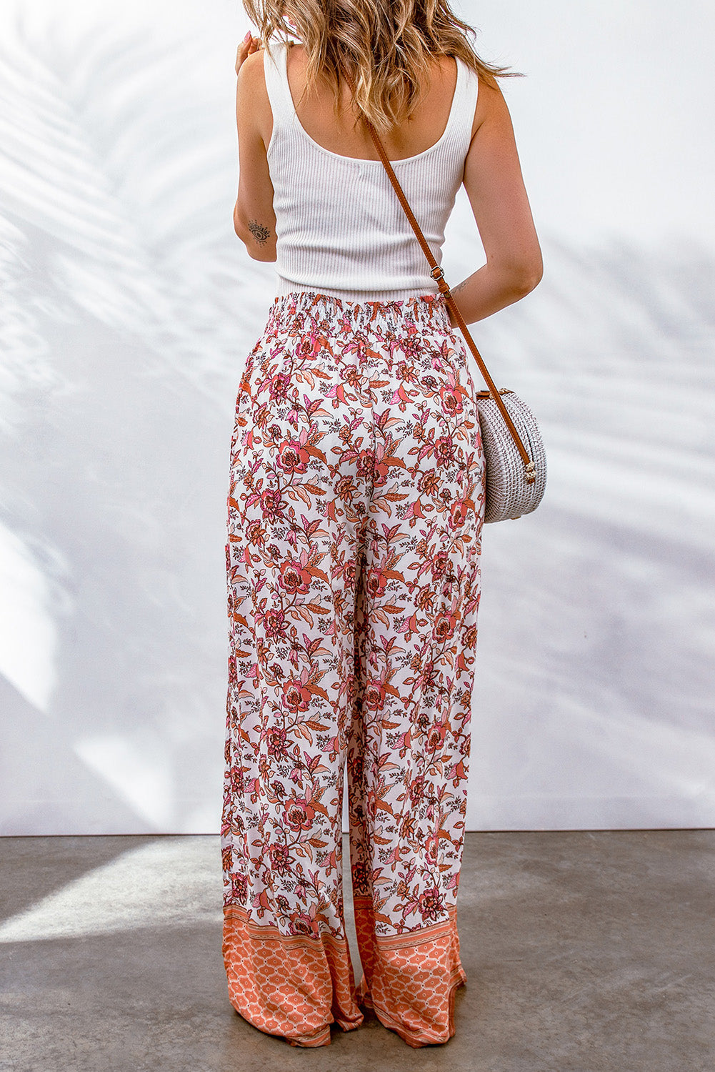Lightweight and flowy floral print palazzo pants with contrasting hem patterns